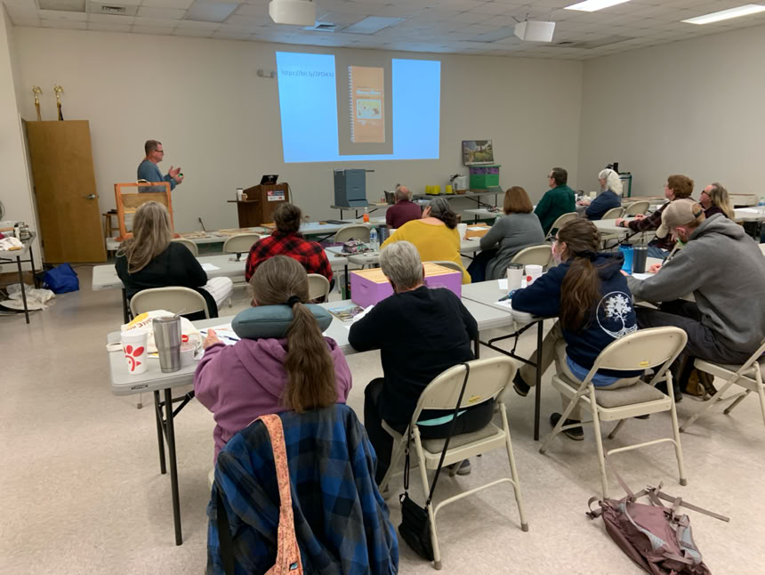 NC State Bee Inspector, Lewis Cauble, teachinh=g HCBA members about varroa mites.