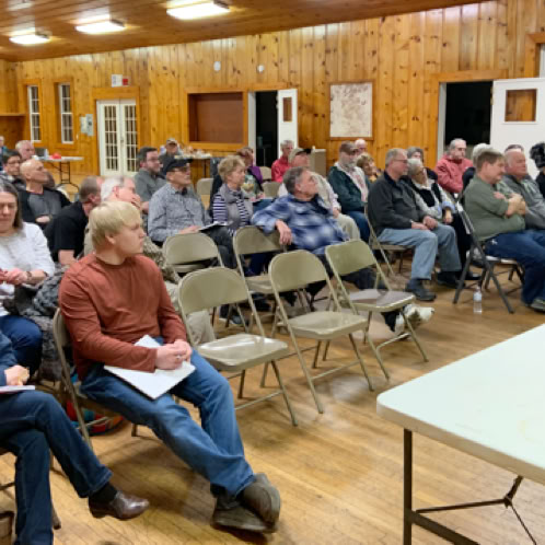 HCBA members learning about honey bee winter feedings.