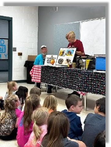 Beth teaching students about honey bees and pollination.